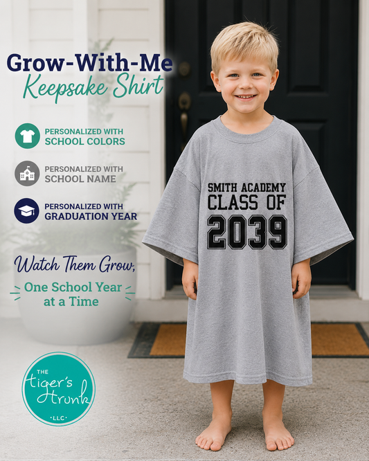Child wearing a 'Smith Academy Class of 2039' shirt with promotional text about a 'Grow-With-Me' keepsake shirt.