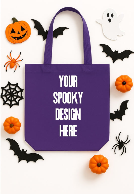 Purple tote bag with Halloween-themed decorations on a white background