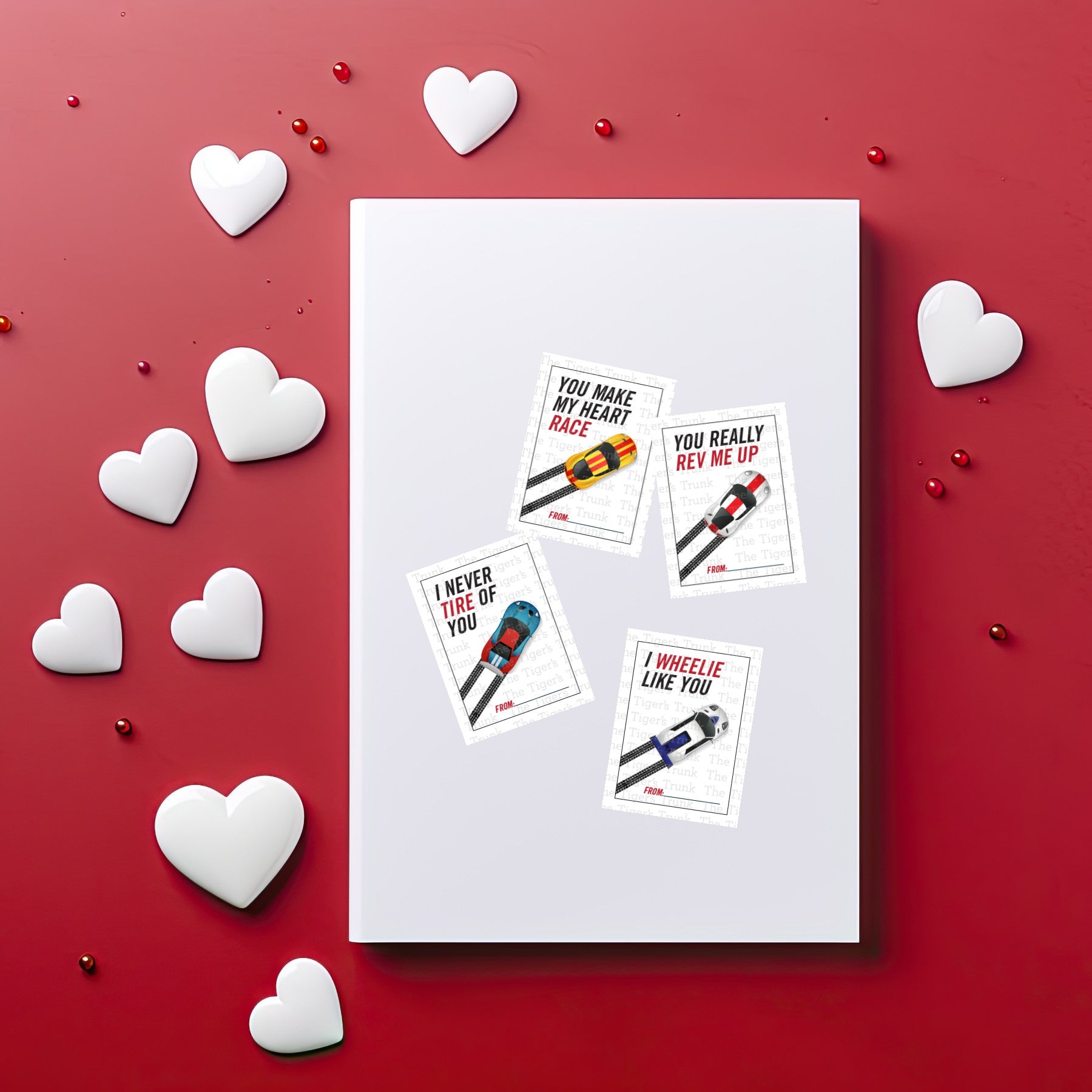 Printable digital Valentine’s cards with racecar designs, 8 unique designs and 4 slogans, perfect for kids and classroom exchanges.