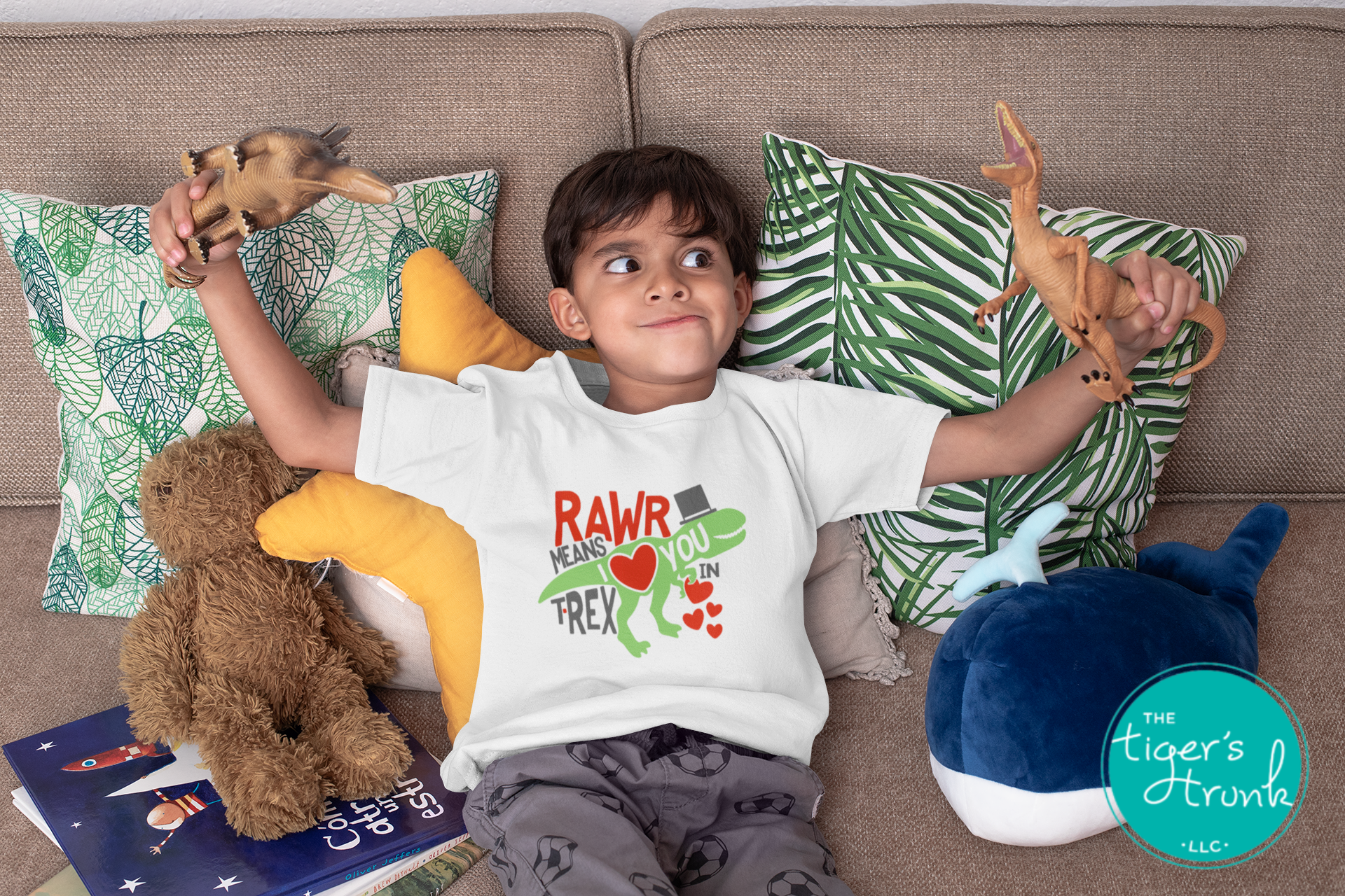 Kids Valentine’s Day t-shirt with a playful T-Rex graphic and the phrase Rawr Means I Love You in T-Rex, perfect for dinosaur fans.