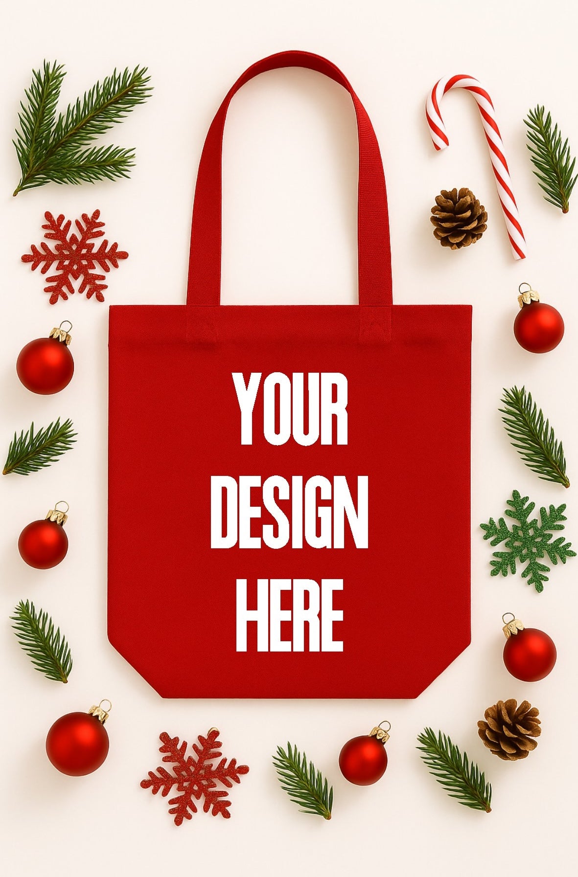 Red tote bag with 'Your Design Here' text, surrounded by Christmas decorations on a white background