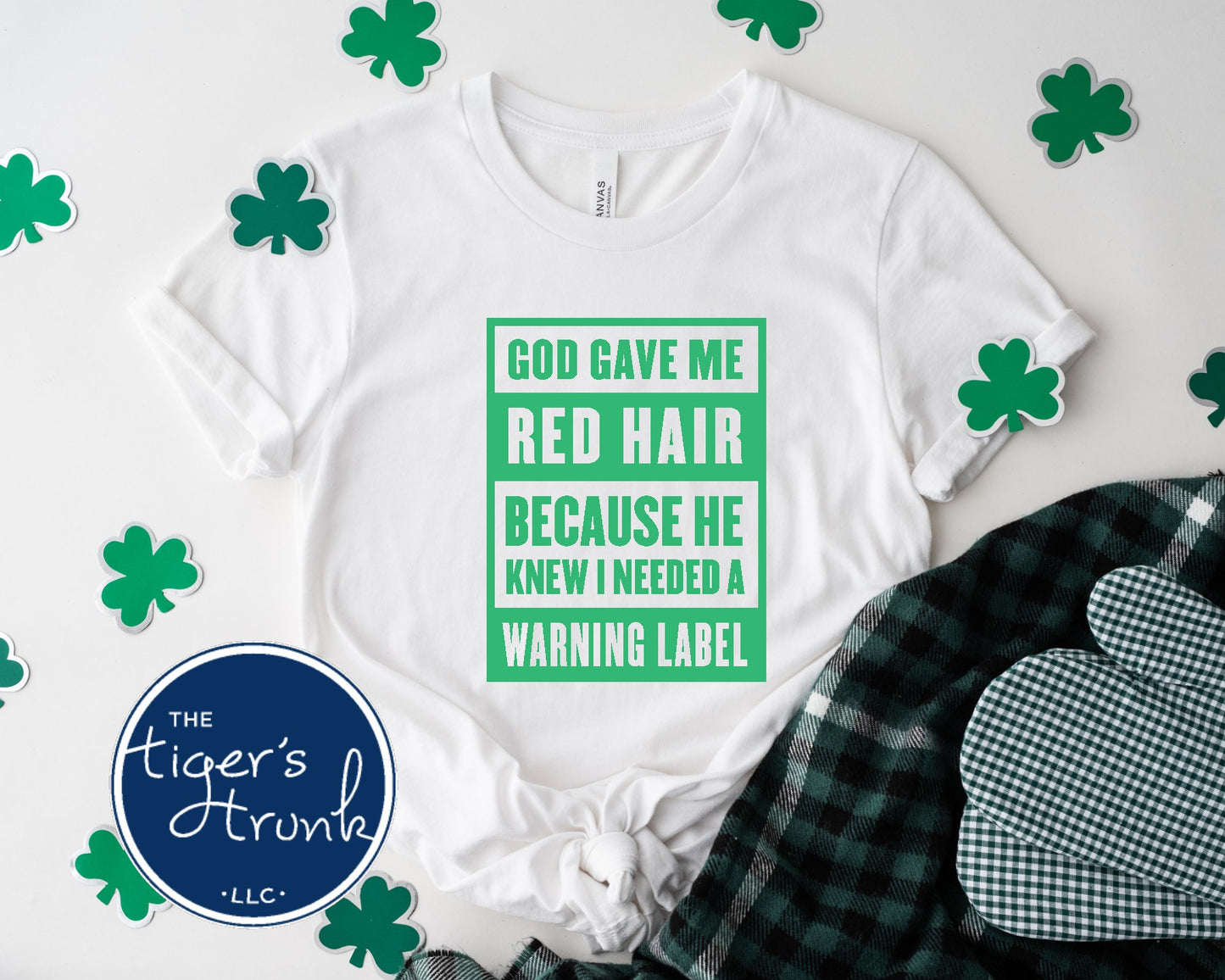 White St. Patrick’s Day red hair warning label shirt with green lettering and shamrock décor.