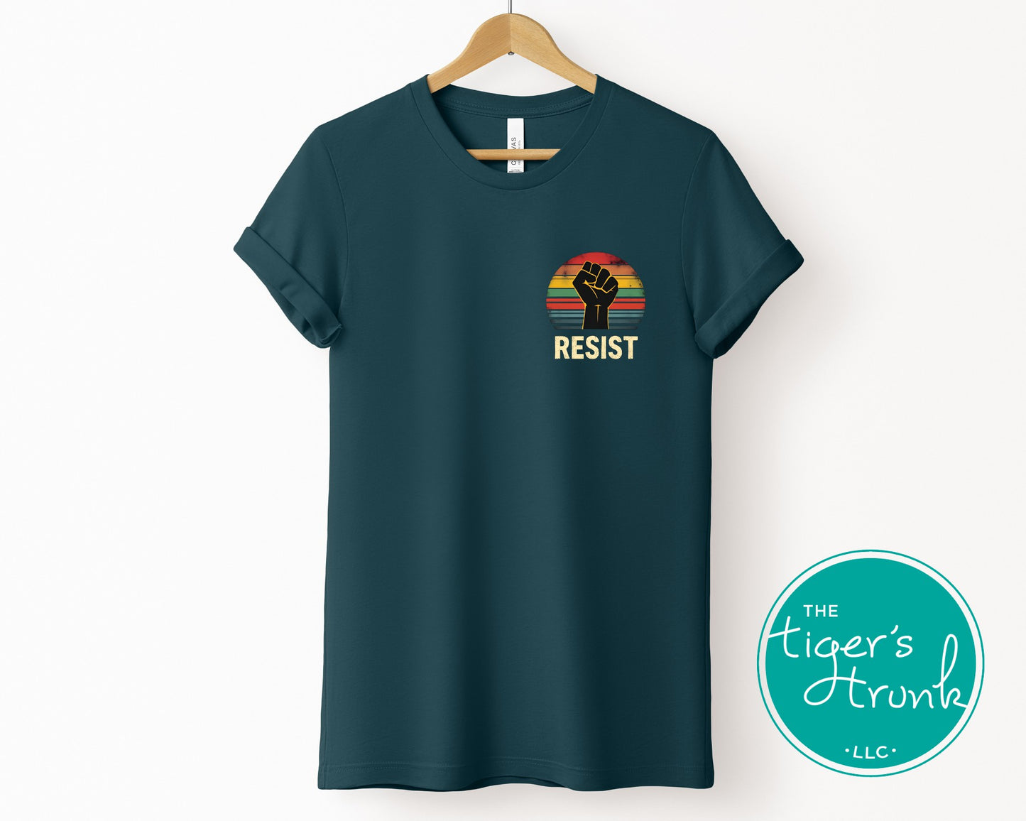 Protest t-shirt with Resist and a bold fist graphic, symbolizing activism and social justice