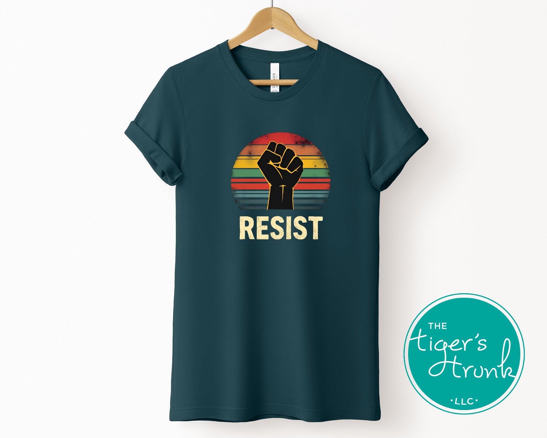 Protest t-shirt with Resist and a bold fist graphic, symbolizing activism and social justice