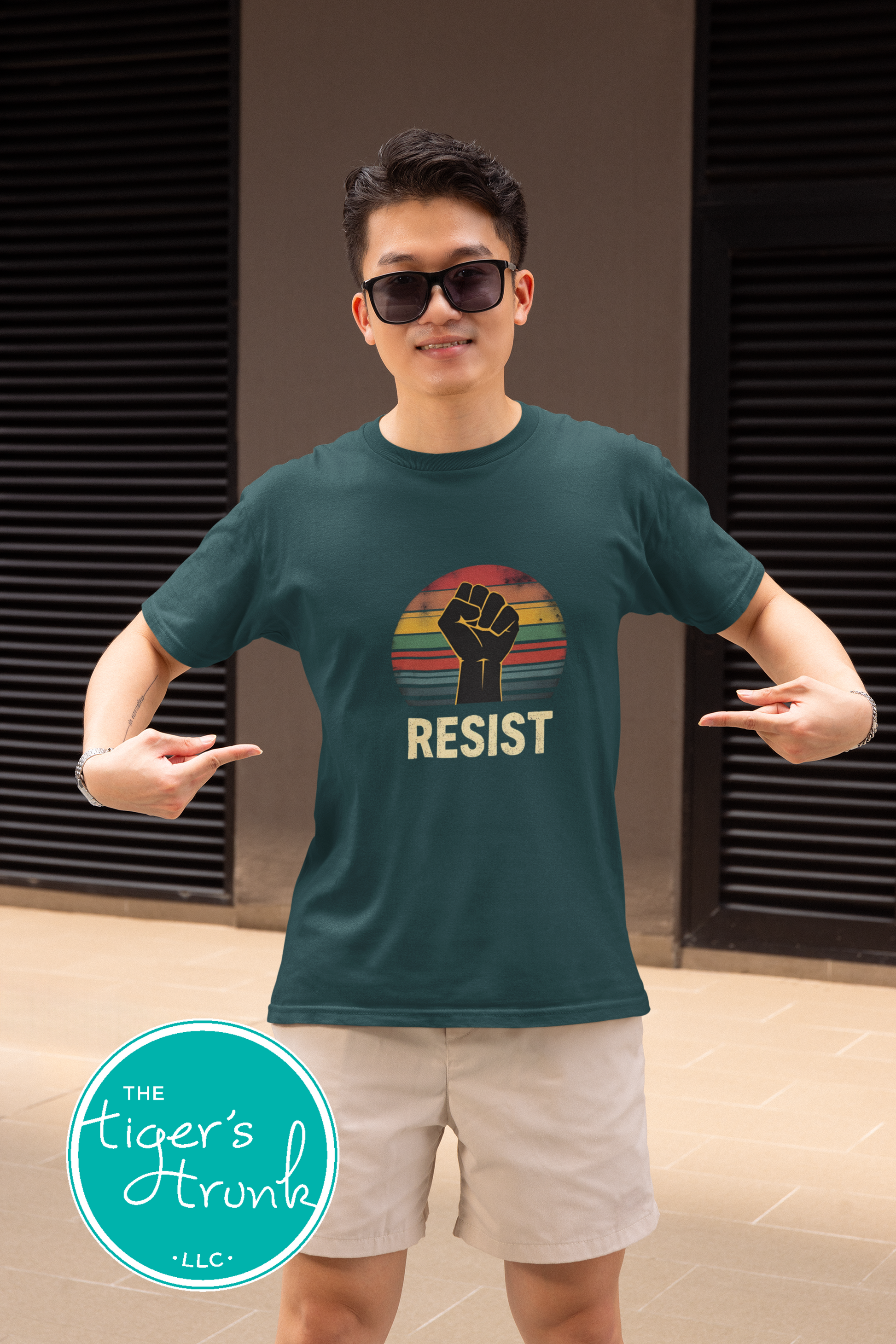 Protest t-shirt with Resist and a bold fist graphic, symbolizing activism and social justice