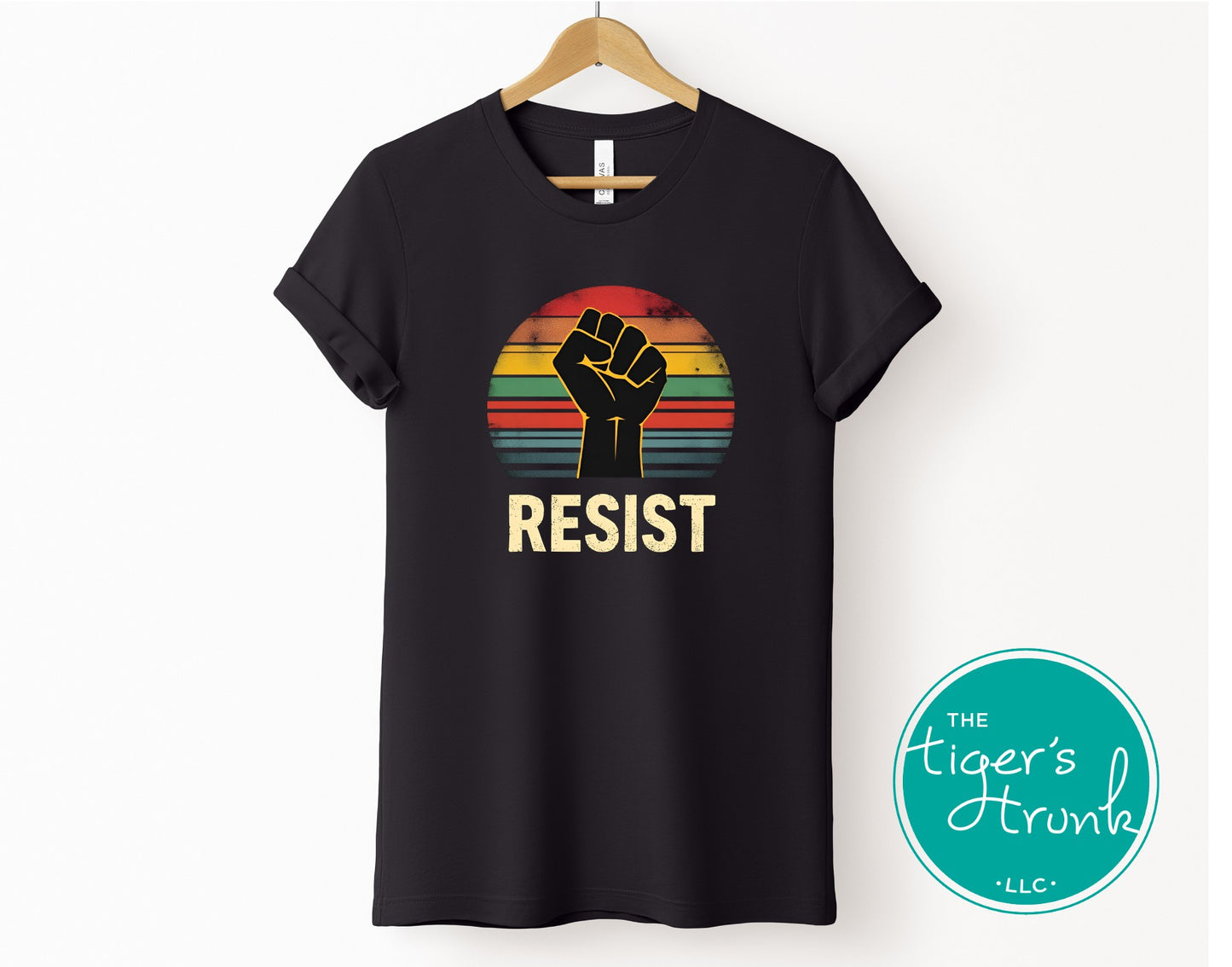 Protest t-shirt with Resist and a bold fist graphic, symbolizing activism and social justice