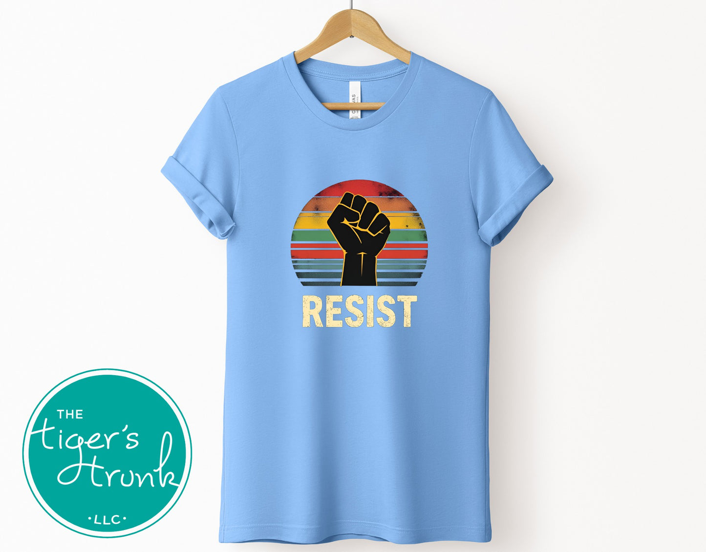 Protest t-shirt with Resist and a bold fist graphic, symbolizing activism and social justice