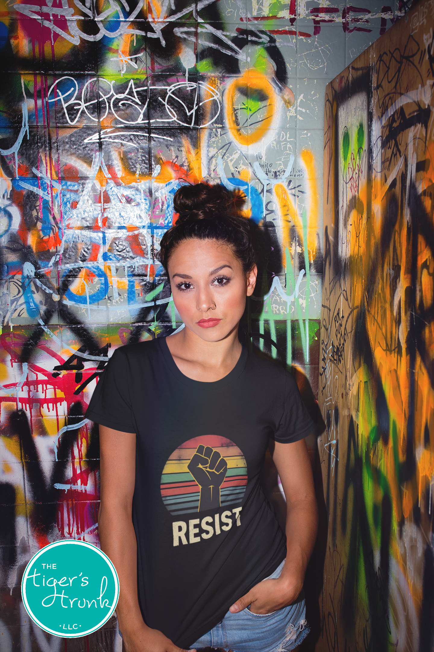 Protest t-shirt with Resist and a bold fist graphic, symbolizing activism and social justice