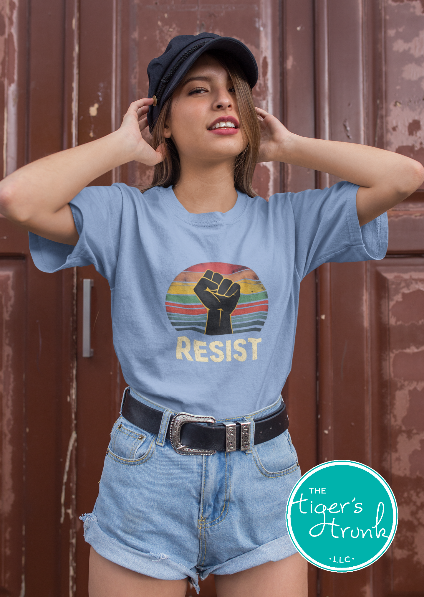 Protest t-shirt with Resist and a bold fist graphic, symbolizing activism and social justice