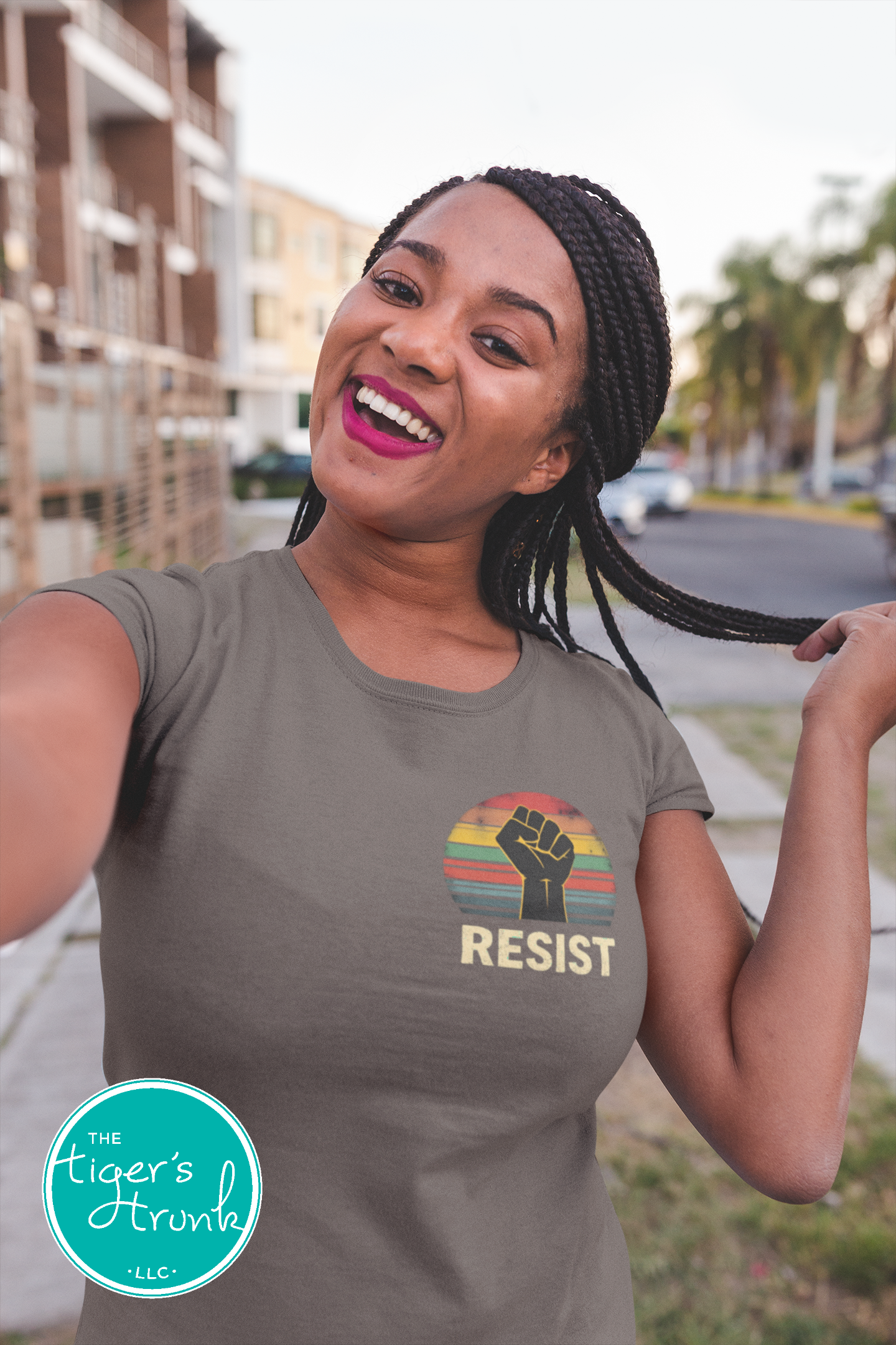 Protest t-shirt with Resist and a bold fist graphic, symbolizing activism and social justice