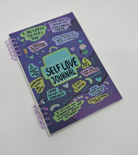 Self Love Journal with lined pages, daily laminated self check-in page, and self-positive stickers for moms’ self-care.