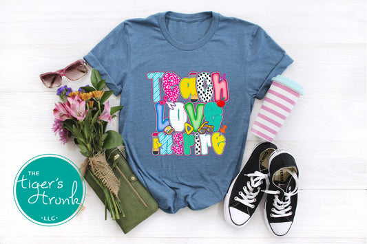 T-shirt with "Teach Love Inspire" message, inspirational and positive graphic tee for teachers and school staff