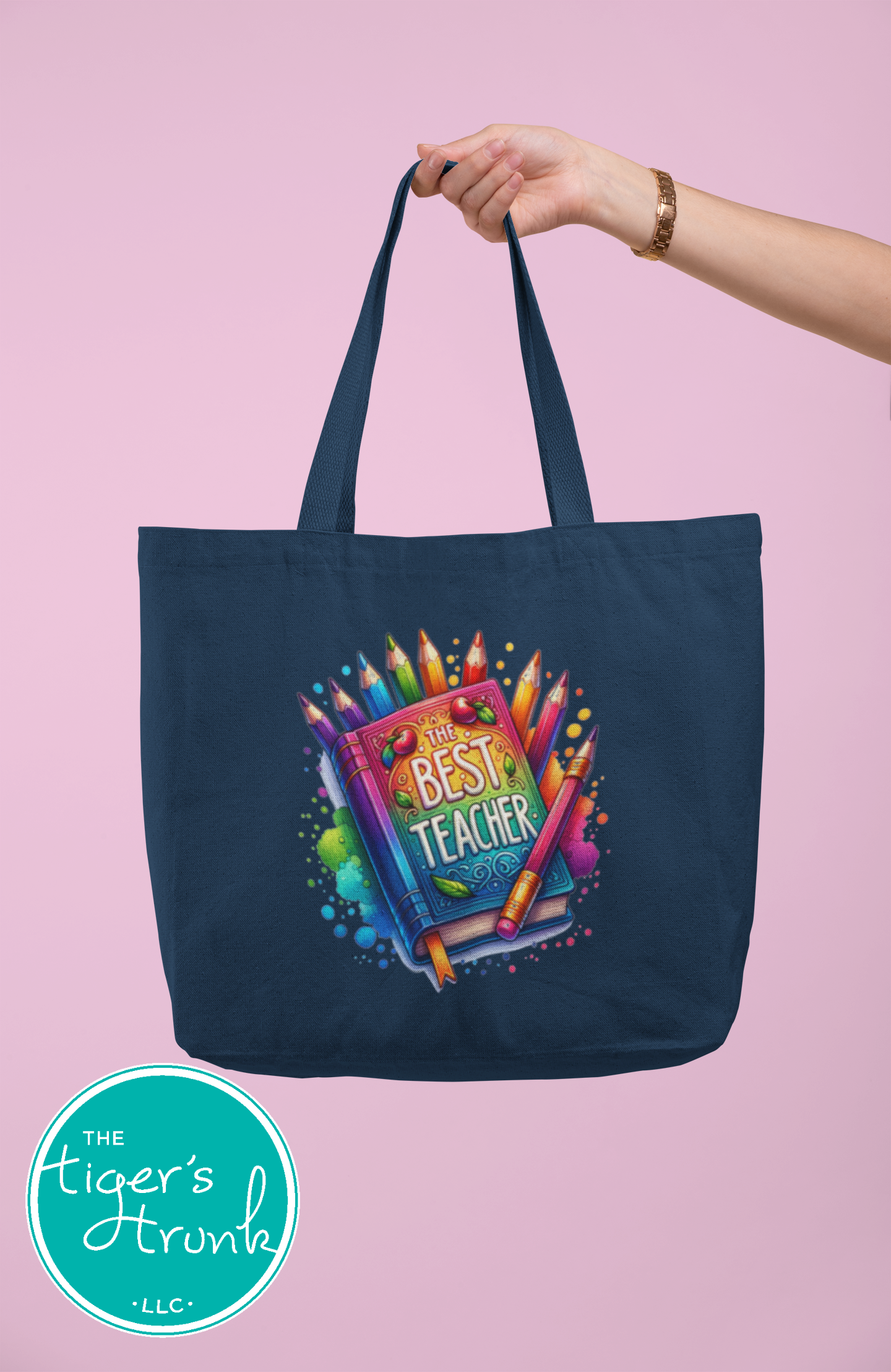Heavy-duty cotton canvas tote bag with colorful "The Best Teacher" graphic, features gusset and long handles for classroom or everyday use