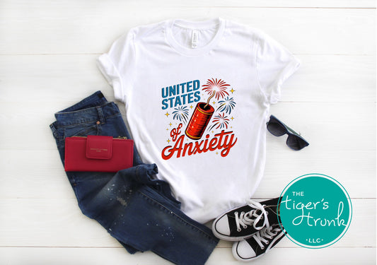 T-shirt with firework graphic and text reading United States of Anxiety, sarcastic patriotic mental health design
