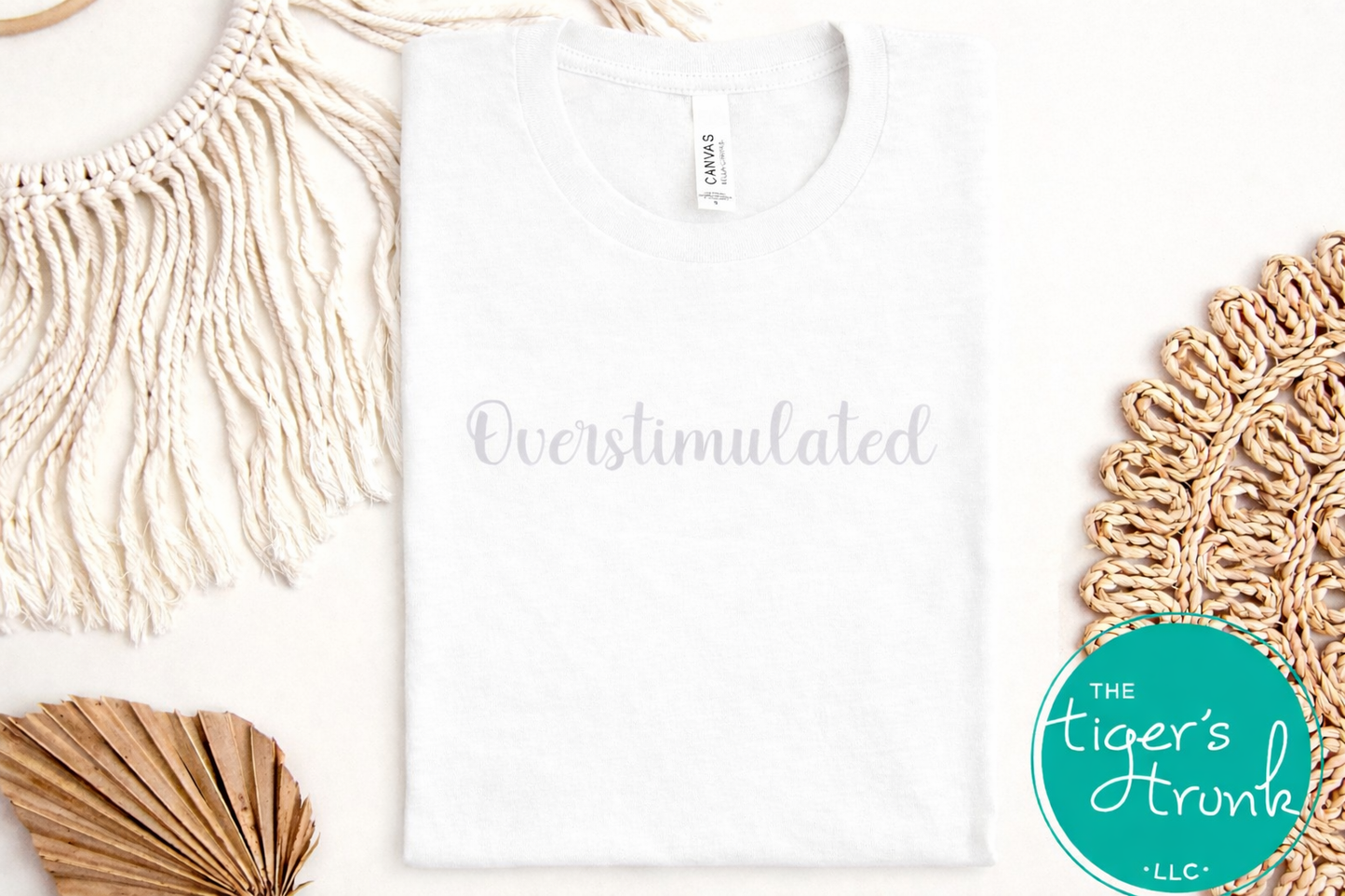 White overstimulated shirt with subtle script design