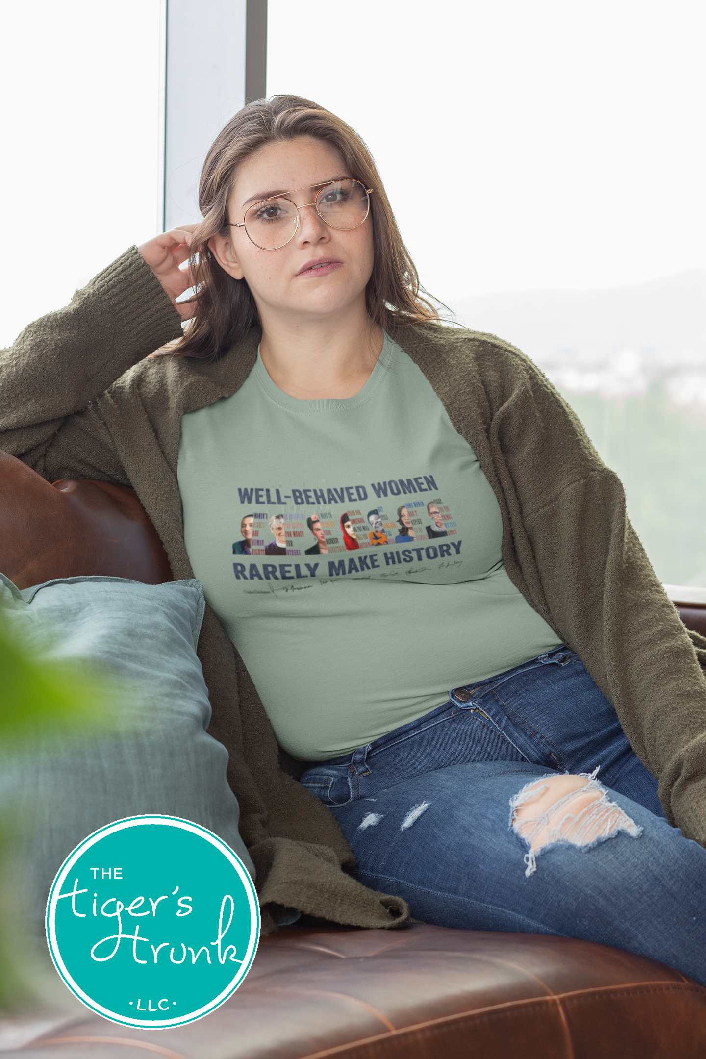 Feminist t-shirt featuring a powerful message with illustrations of history-making women, activist statement apparel