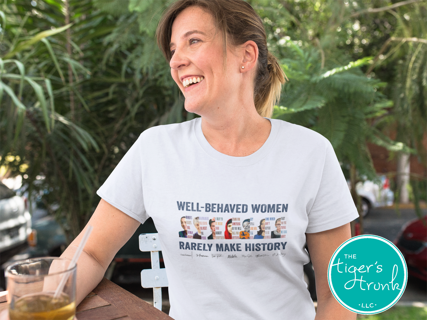 Feminist t-shirt featuring a powerful message with illustrations of history-making women, activist statement apparel