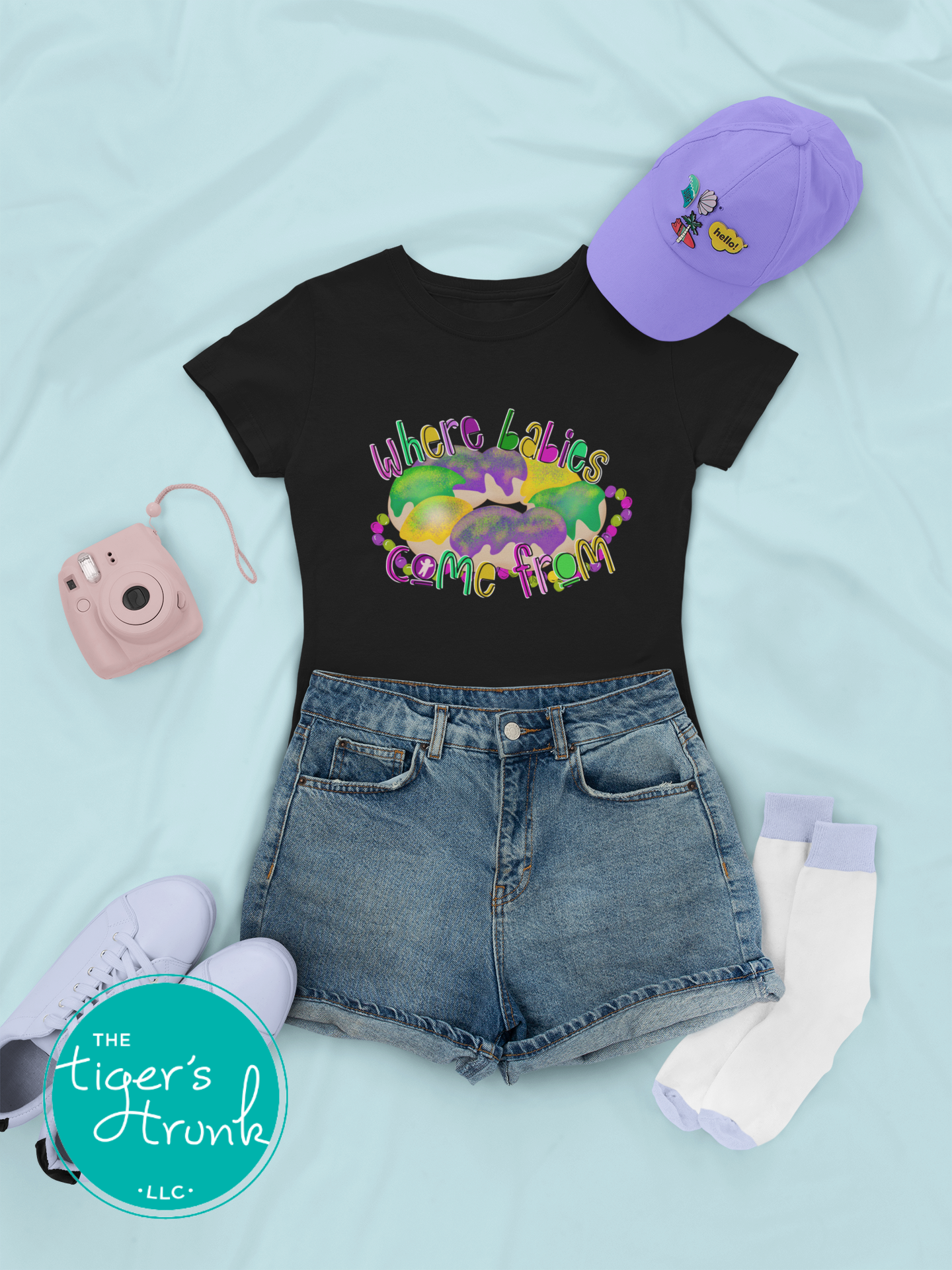 Mardi Gras t-shirt with a watercolor king cake graphic and the phrase Where Babies Come From, perfect for parades and parties.