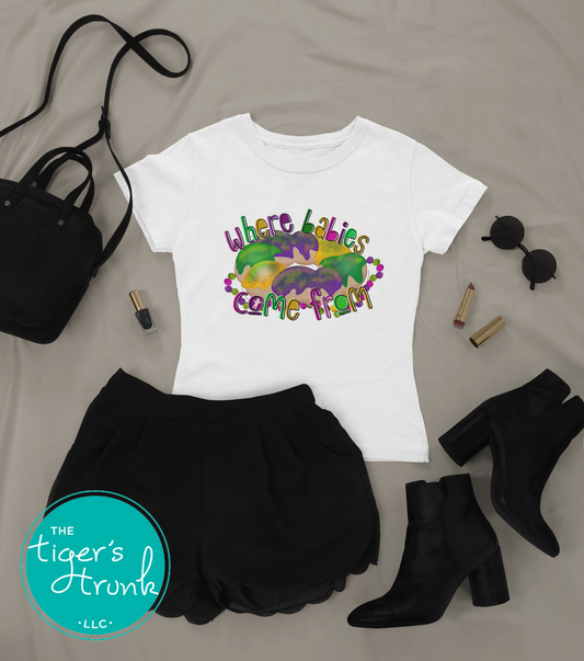 Mardi Gras t-shirt with a watercolor king cake graphic and the phrase Where Babies Come From, perfect for parades and parties.