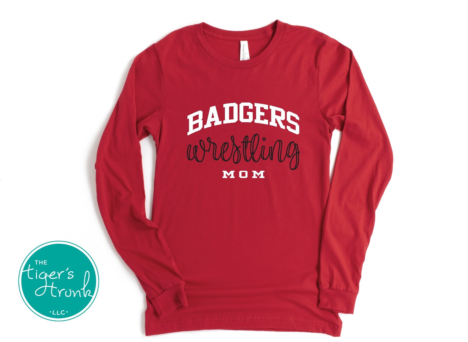 Red long-sleeve shirt with 'Badgers Wrestling Mom' text on a white background