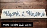 Uncork and Unwind wine sign