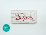 Believe Christmas sign