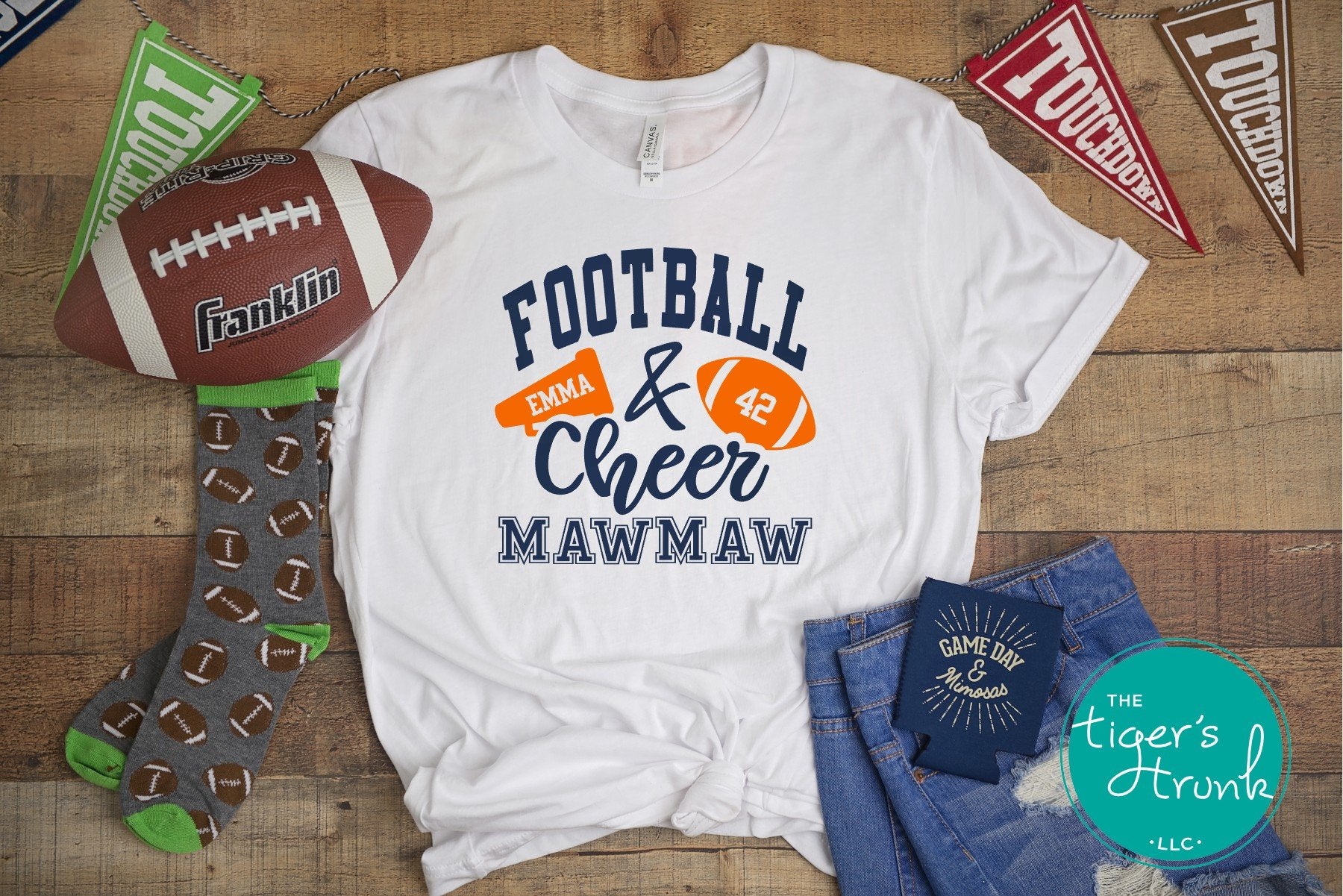 Football and Cheer Mawmaw shirt with megaphone and football design, customized with grandparent nickname, school colors, and names