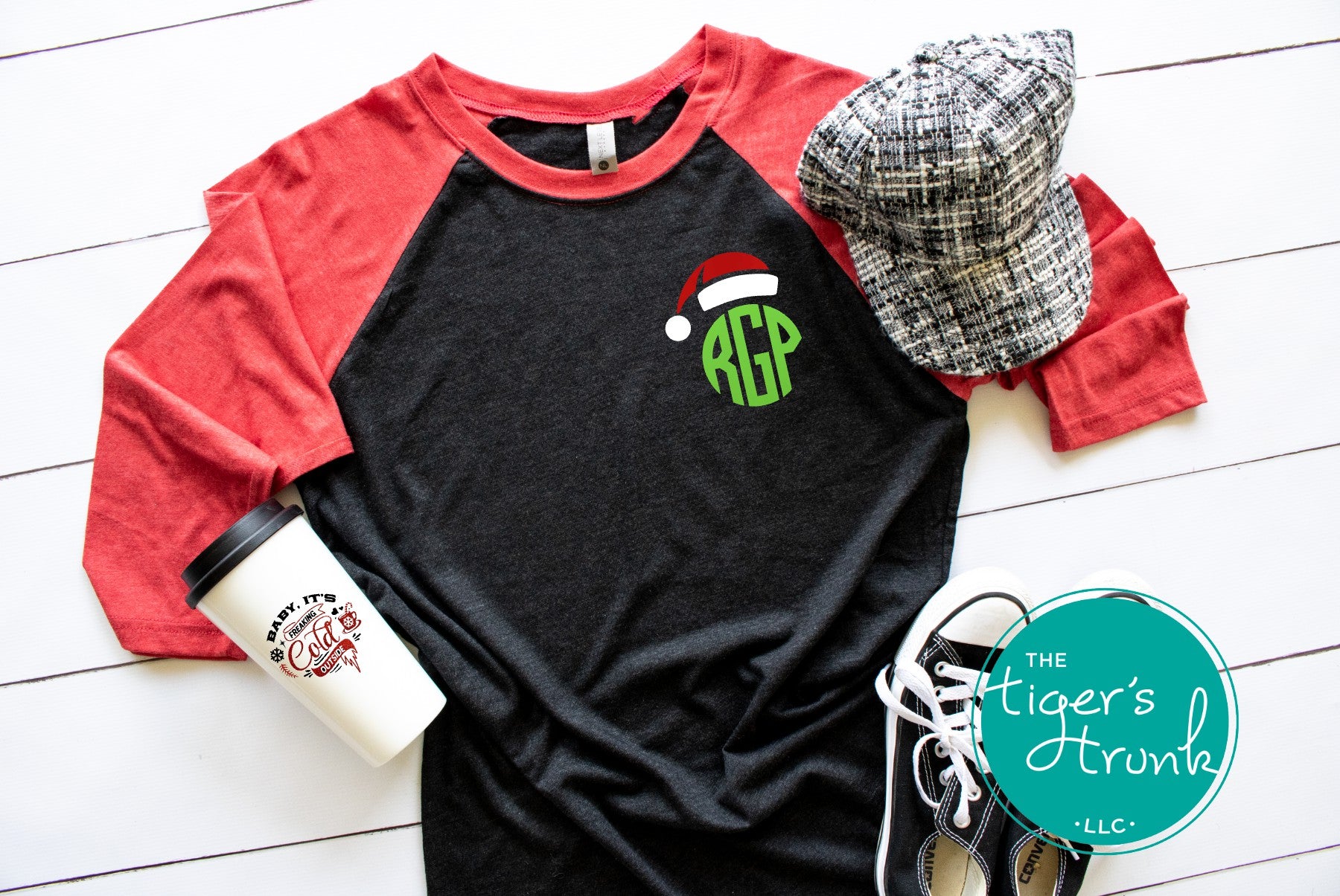 Black and red raglan holiday shirt with round green monogram and Santa hat