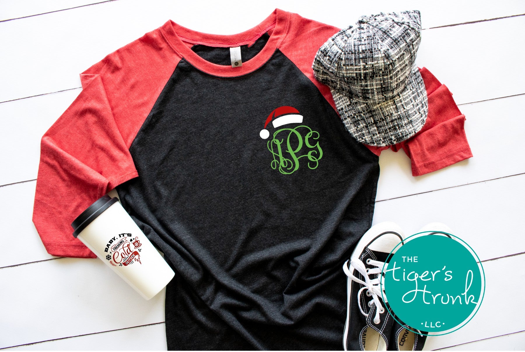 Black and red raglan holiday shirt with script green monogram and Santa hat