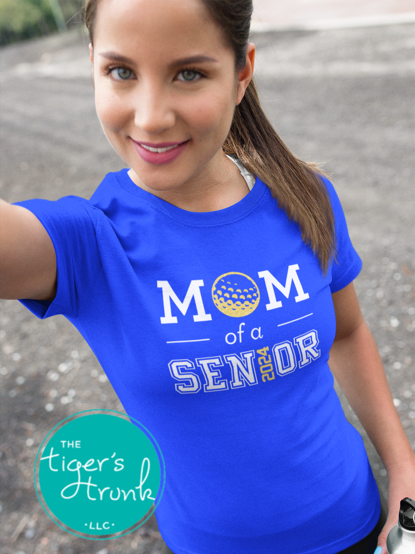 Royal blue shirt featuring Mom of a Senior 2024 golf graphic personalized for any team.