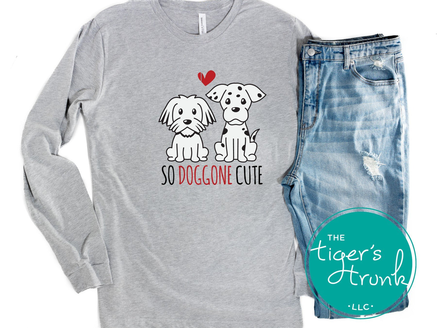 Valentine’s Day shirt featuring adorable puppies with the text "So Doggone Cute," perfect for dog lovers and festive celebrations.