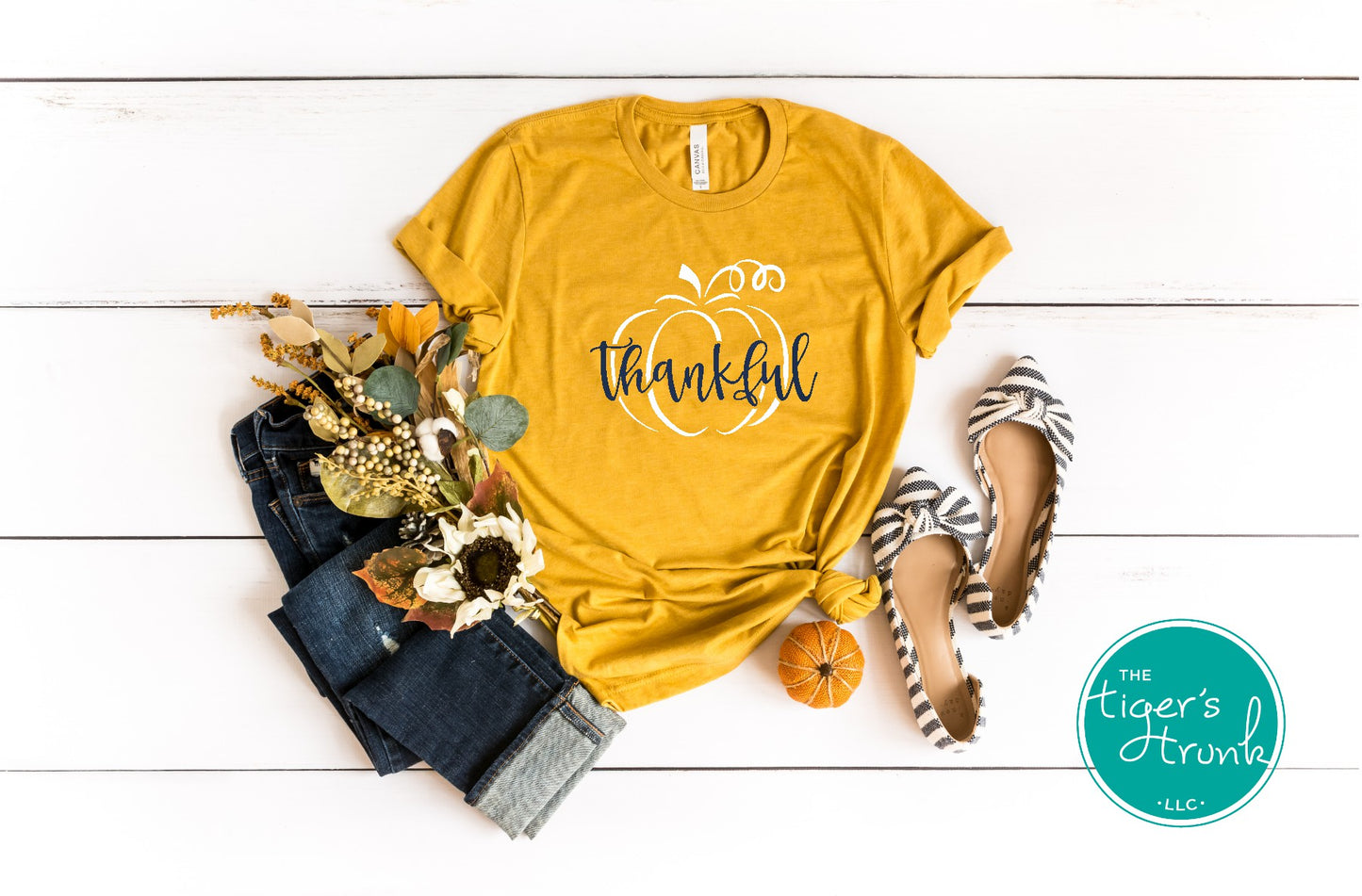 Mustard yellow short sleeve thankful t-shirt with white pumpkin design, fall shirt