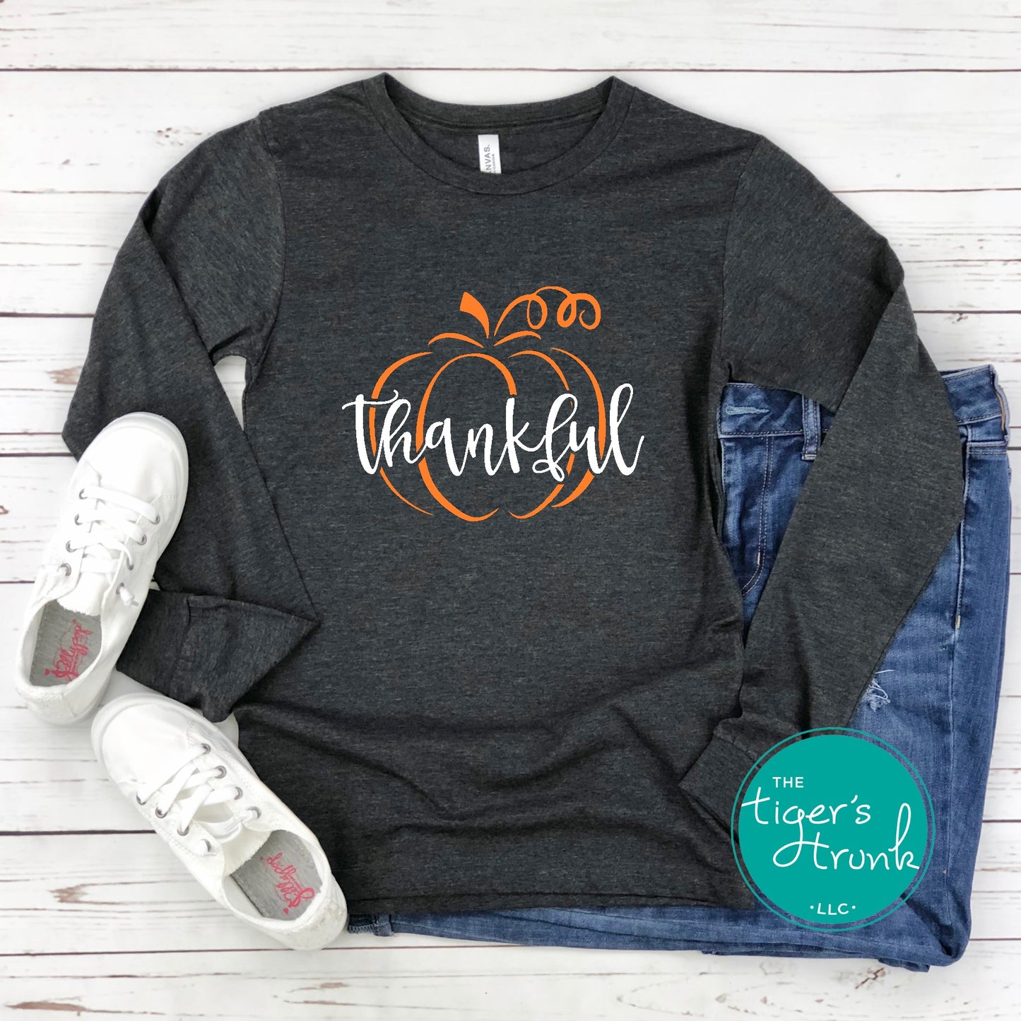 Heather dark gray long sleeve shirt with orange pumpkin and white thankful text, fall thanksgiving shirt
