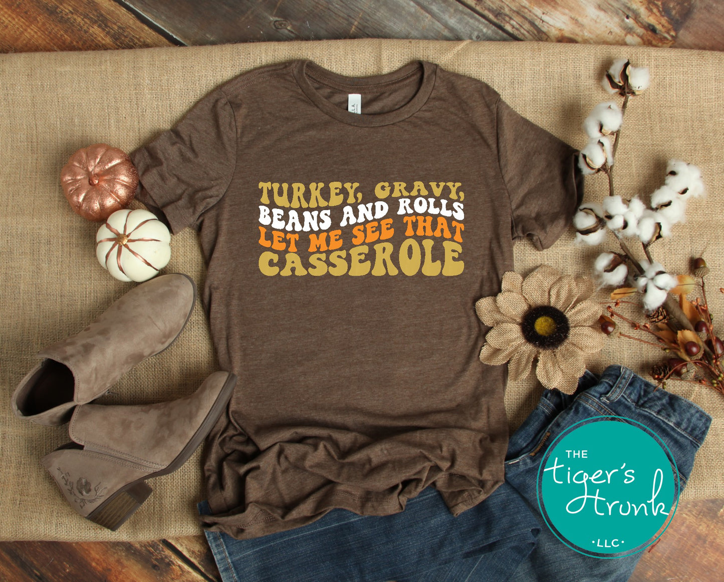 Funny Thanksgiving shirt and baby bodysuit with fall colors and phrase “Turkey, Gravy, Beans and Rolls, Let Me See That Casserole.”