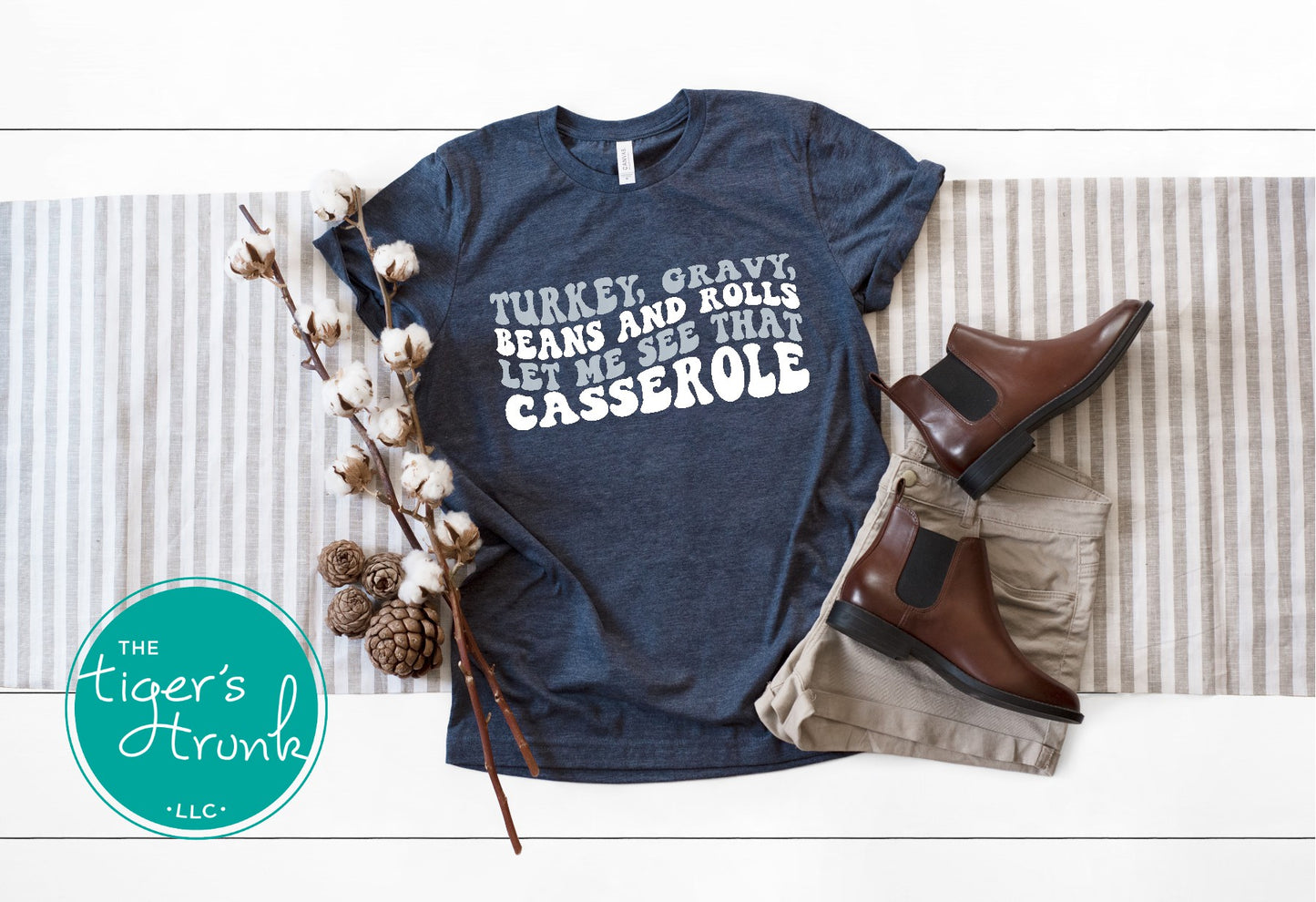 Funny Thanksgiving shirt and baby bodysuit with fall colors and phrase “Turkey, Gravy, Beans and Rolls, Let Me See That Casserole.”